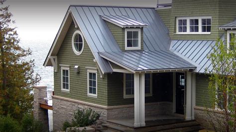 grey metal roof green house red door|gray roof with green exterior.